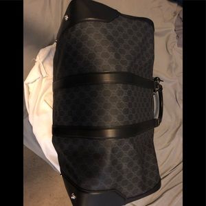 Full travel size Gucci duffle bag.